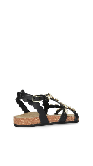 Sandal in black cork leather